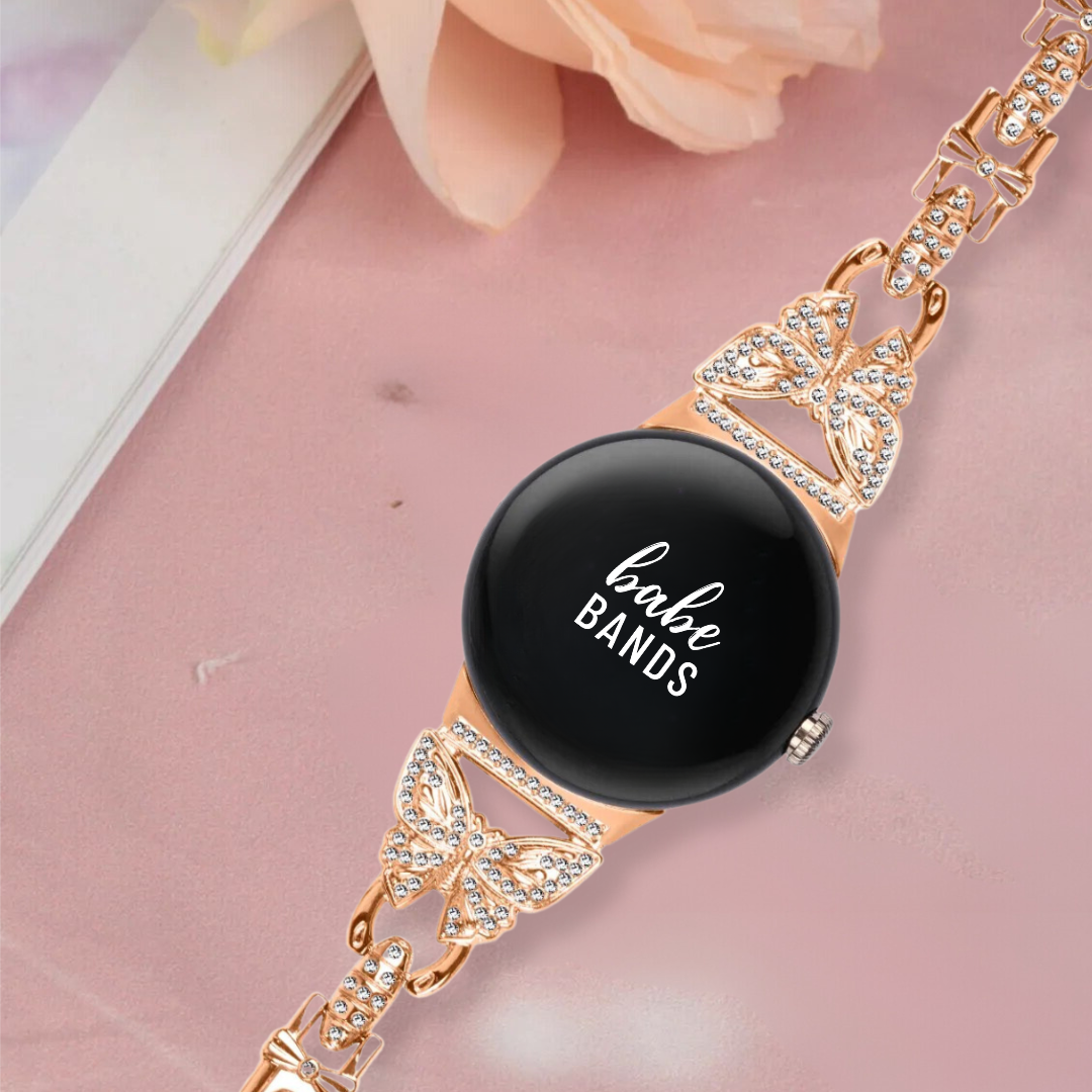 No more basic vibes. Step up your babe game with our premium Babe Bands to elevate your style.   Upgrade your Google Pixel Watch with our Premium Crystal Embellished Butterfly Chain Google Pixel Watch Band.  Indulge in the luxury look and feel of our Google Pixel Watch band, crafted from high-quality stainless steel with beautiful butterfly and bow detail, with shining faux diamond embellishments. 