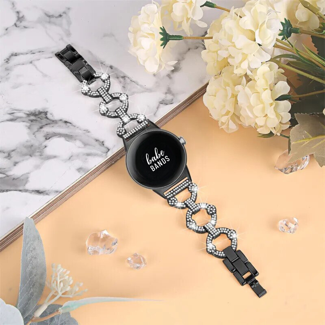 No more basic vibes. Step up your babe game with our premium Babe Bands to elevate your style.   Upgrade your Google Pixel Watch with our Premium Crystal Embellished O-Chain Band No Gap Google Pixel Watch Band.  Indulge in the luxury look and feel of our Google Pixel Watch band, crafted from high-quality stainless steel in an elegant o-chain style, with shining faux diamond embellishments. 