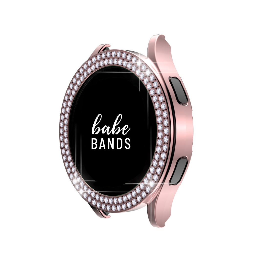 No more basic vibes. Step up your babe game with our premium Babe Bands Case to elevate your Samsung Galaxy Watch style.    Upgrade your Samsung Galaxy Watch with our Premium Double Row Rhinestone Samsung Galaxy Watch Case.  Indulge in the luxury look of our Samsung Galaxy Watch case, crafted from high-quality materials including a durable Polycarbonate case (without screen protector) and sparkling faux diamond border.