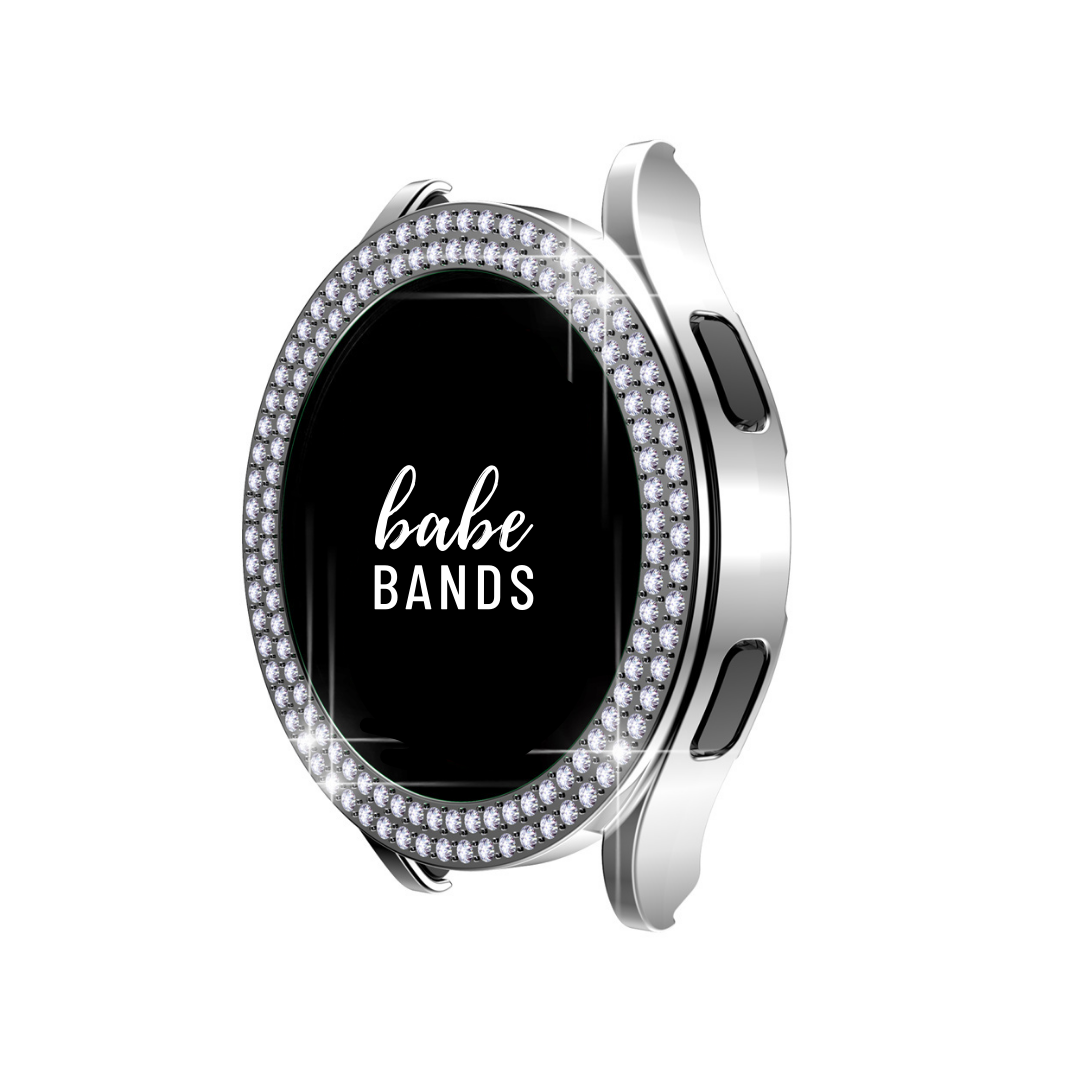 No more basic vibes. Step up your babe game with our premium Babe Bands Case to elevate your Samsung Galaxy Watch style.    Upgrade your Samsung Galaxy Watch with our Premium Double Row Rhinestone Samsung Galaxy Watch Case.  Indulge in the luxury look of our Samsung Galaxy Watch case, crafted from high-quality materials including a durable Polycarbonate case (without screen protector) and sparkling faux diamond border.