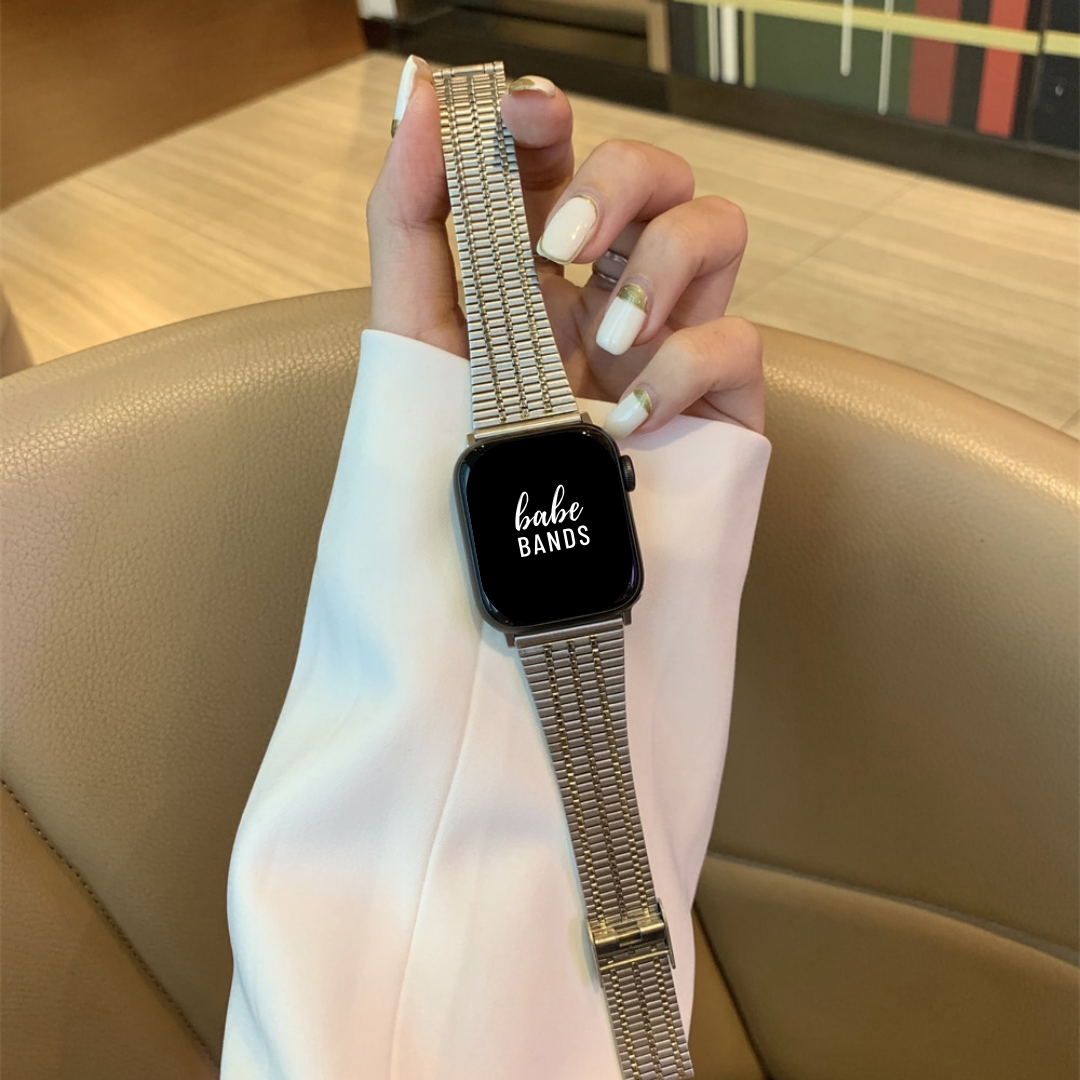 No more basic vibes. Step up your babe game with our premium Babe Bands to elevate your style.    Upgrade your Apple Watch with our Premium Slim Stainless 3 Stripe Classic Style Apple Watch Band.  Indulge in the luxury look and feel of our Apple Watch band, crafted from high-quality stainless steel in a classic watch band style with contrasting stripe detail.