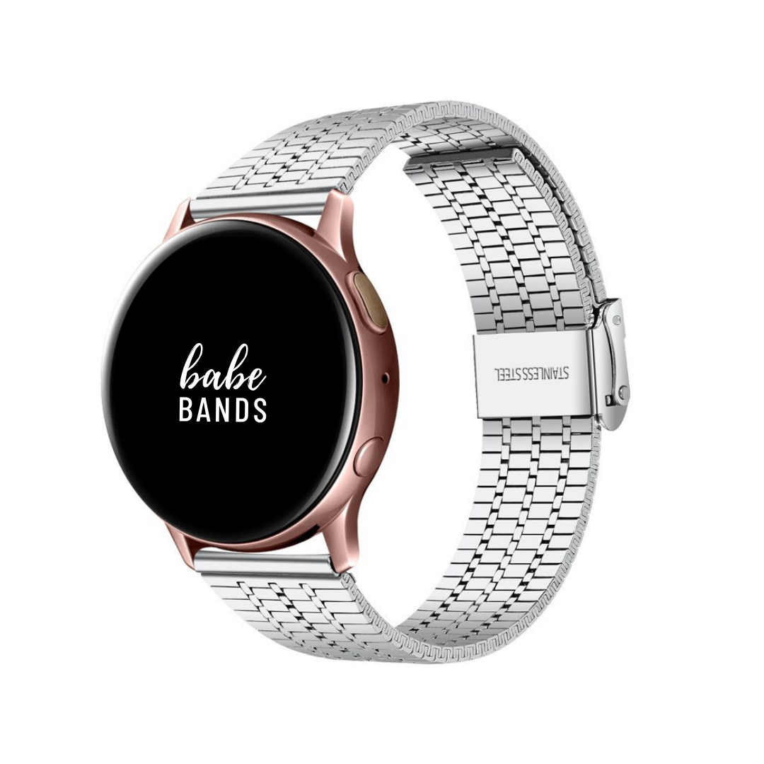 No more basic vibes. Step up your babe game with our premium Babe Bands to elevate your style.  Upgrade your Samsung Galaxy Watch with our Premium Stainless Steel Classic Style Triple Stripe Samsung Galaxy Watch Band. Indulge in the luxury look and feel of our Samsung Galaxy Watch band, crafted from high-quality stainless steel in a classic link style with a triple stripe contrast line detail.