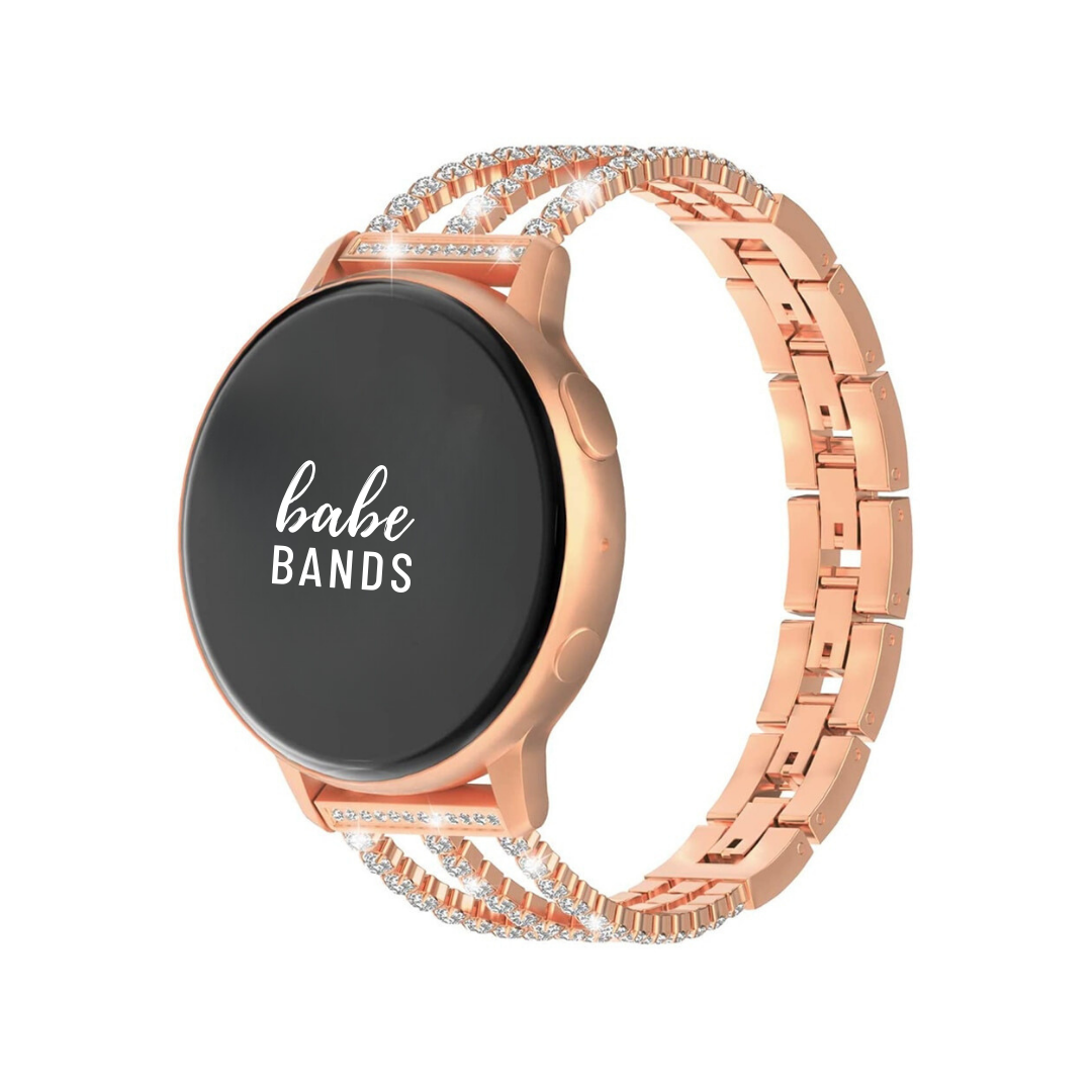 No more basic vibes. Step up your babe game with our premium Babe Bands to elevate your style.   Upgrade your Samsung Galaxy Watch with our Premium Stainless Steel Triple Crystal Strap Samsung Galaxy Watch Band.  Indulge in the luxury look and feel of our Samsung Galaxy Watch band, crafted from high-quality stainless steel in a beautiful triple strap design covered in faux diamonds.