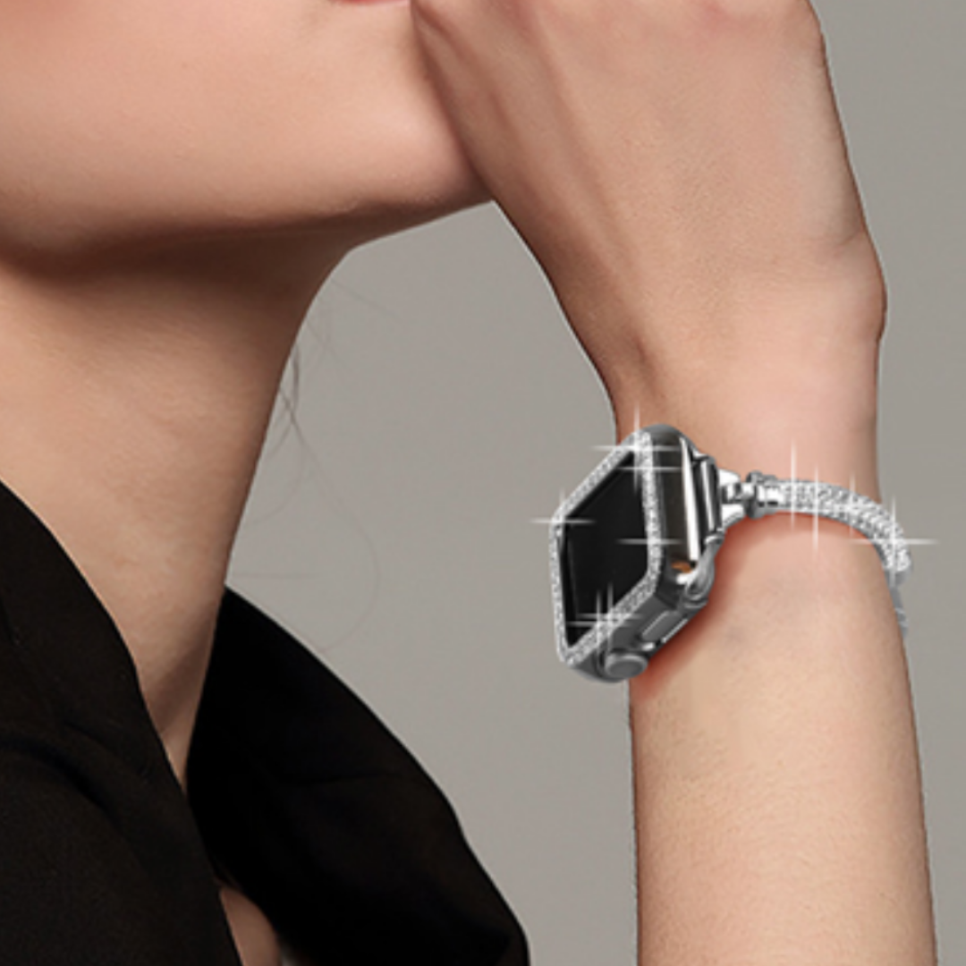 No more basic vibes. Step up your babe game with our premium Babe Bands to elevate your style.    Upgrade your Apple Watch with our Premium Round Crystal Drawstring Band + Cover Set.  Indulge in the luxury look and feel of our Apple Watch band, crafted from high-quality stainless steel in an elegant round bracelet style, with shining faux diamond embellishment  throughout the band and cover.