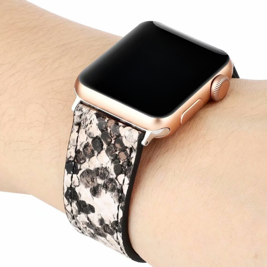 No more basic vibes. Step up your babe game with our premium Babe Bands to elevate your style.    Upgrade your Apple Watch with our Premium Genuine Leather Snake Skin Apple Watch Band.  Indulge in the luxury look and feel of our Apple Watch band, crafted from high-quality snake skin print genuine leather with a stainless steel classic buckle closure. Comes with clear cover.