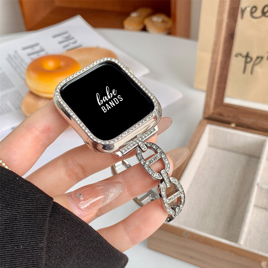 No more basic vibes. Step up your babe game with our premium Babe Bands to elevate your style.    Upgrade your Apple Watch with our Premium Stainless Steel Crystal Embellished Mariner Chain Apple Watch Band.  Indulge in the luxury look and feel of our Apple Watch band, crafted from high-quality stainless steel in gorgeous mariner chain design embellished with faux diamonds for added style.