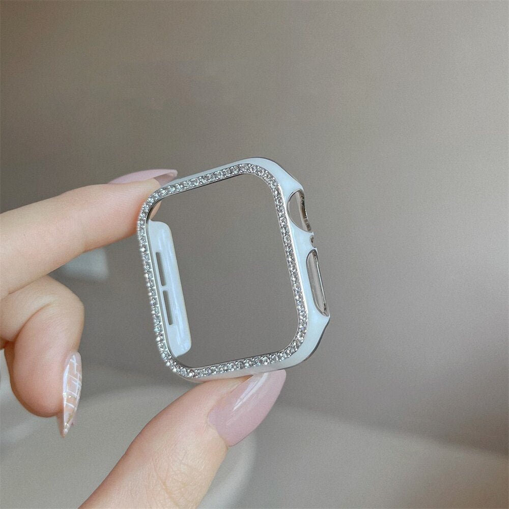 No more basic vibes. Step up your babe game with our premium Babe Bands Case to elevate your Apple Watch style.    Upgrade your Apple Watch with our Premium Single Row Rhinestone Contrast Apple Watch Bumper Case.  Indulge in the luxury look of our Apple Watch case, crafted from high-quality materials including a durable Polycarbonate case with a contrast color trim and a single row sparkling faux diamond border.